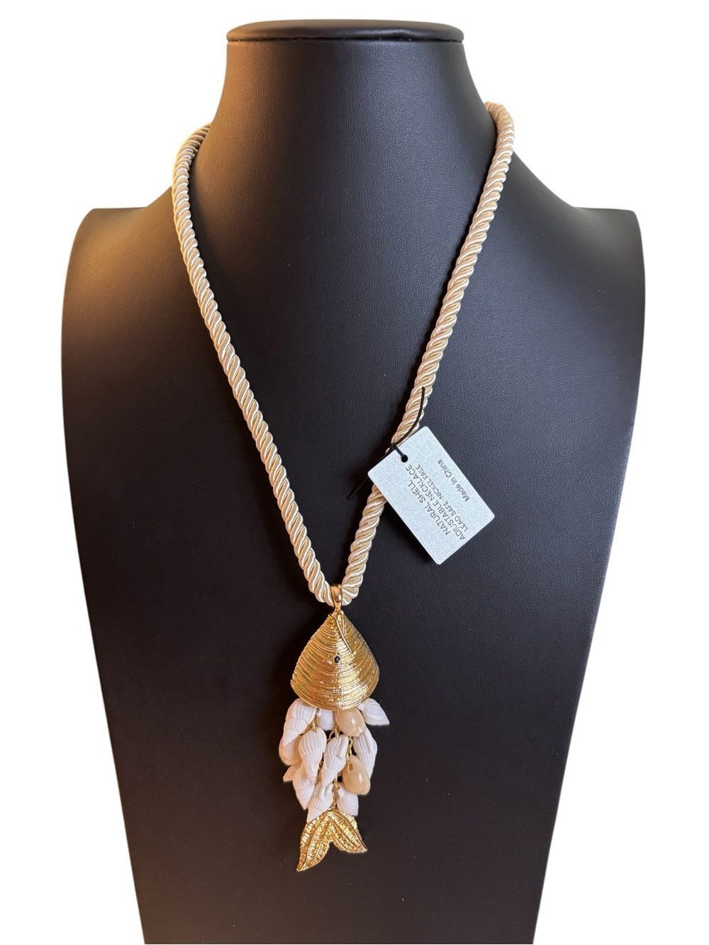 Gold Tone Fish Pendant w/ White Seashells, Textured Tail Fin on Adjustable Cord.